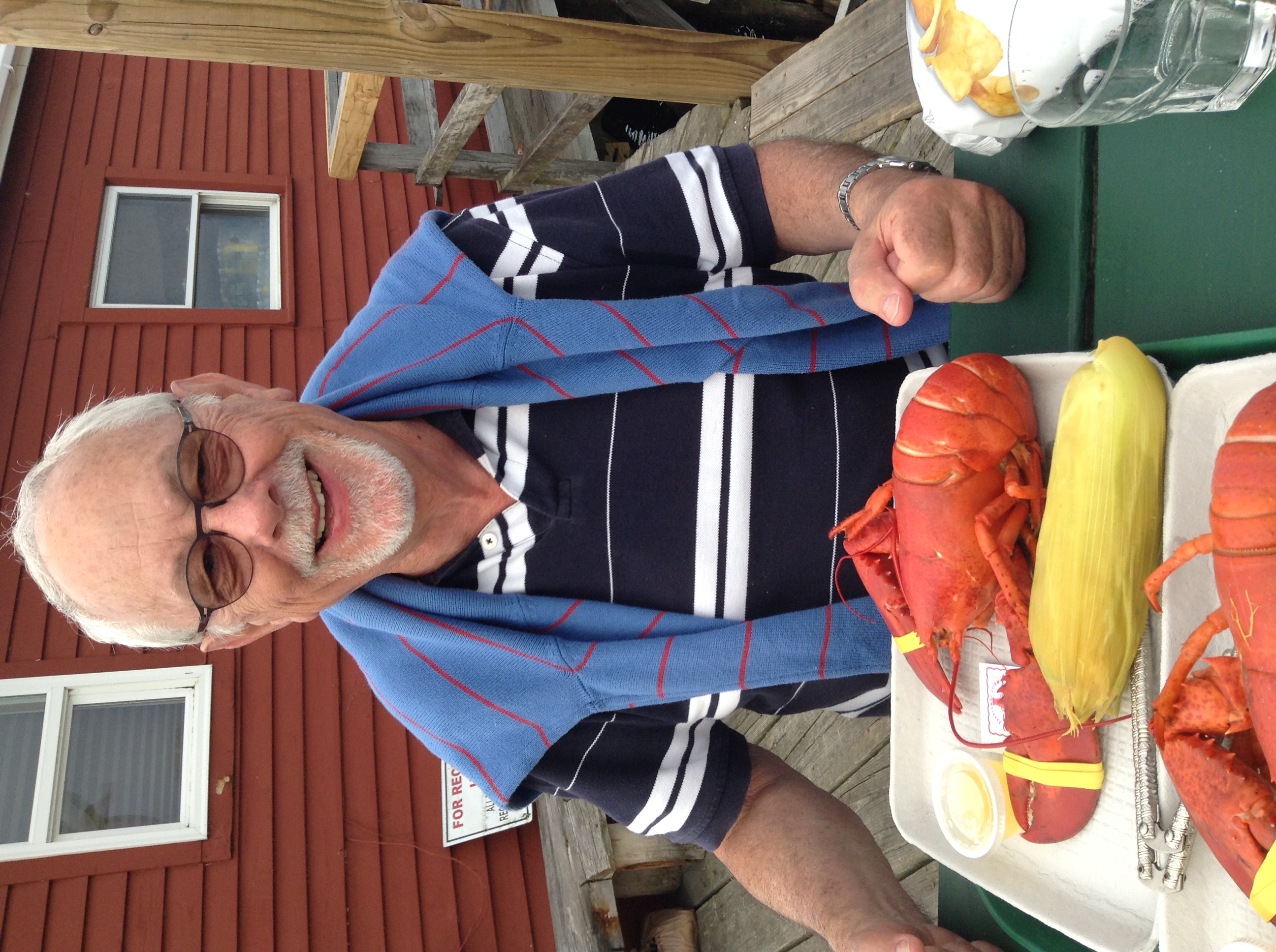 John smiling with some lobsters. 