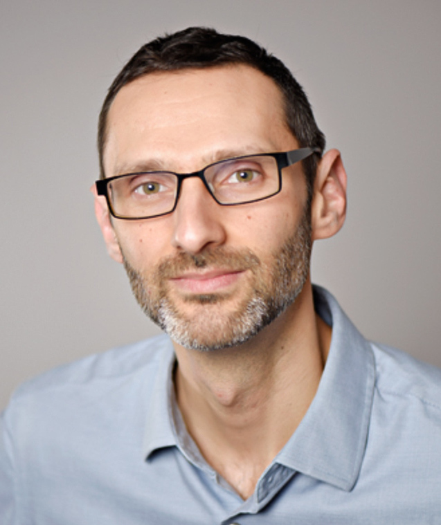 Matti Siemiatycki smiling at camera.