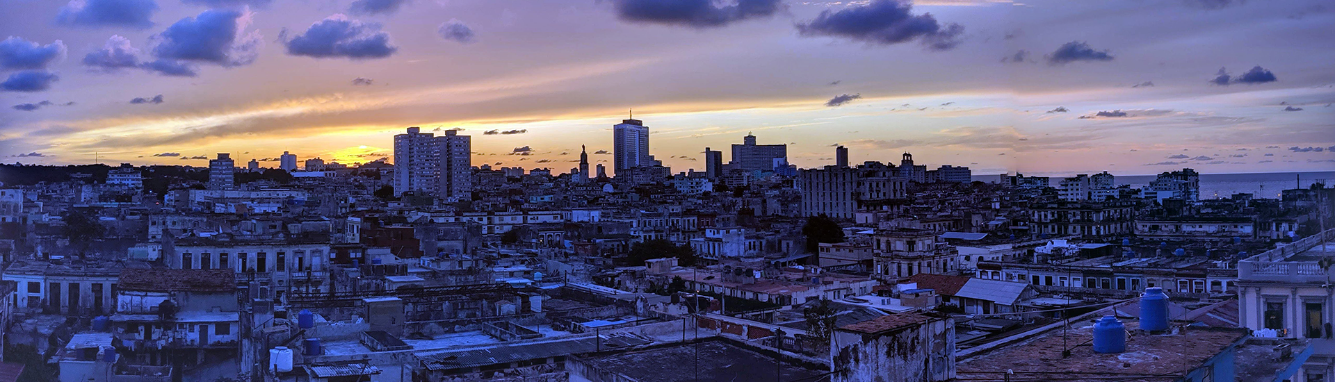 photograph of an urban landscape as the sun sets 